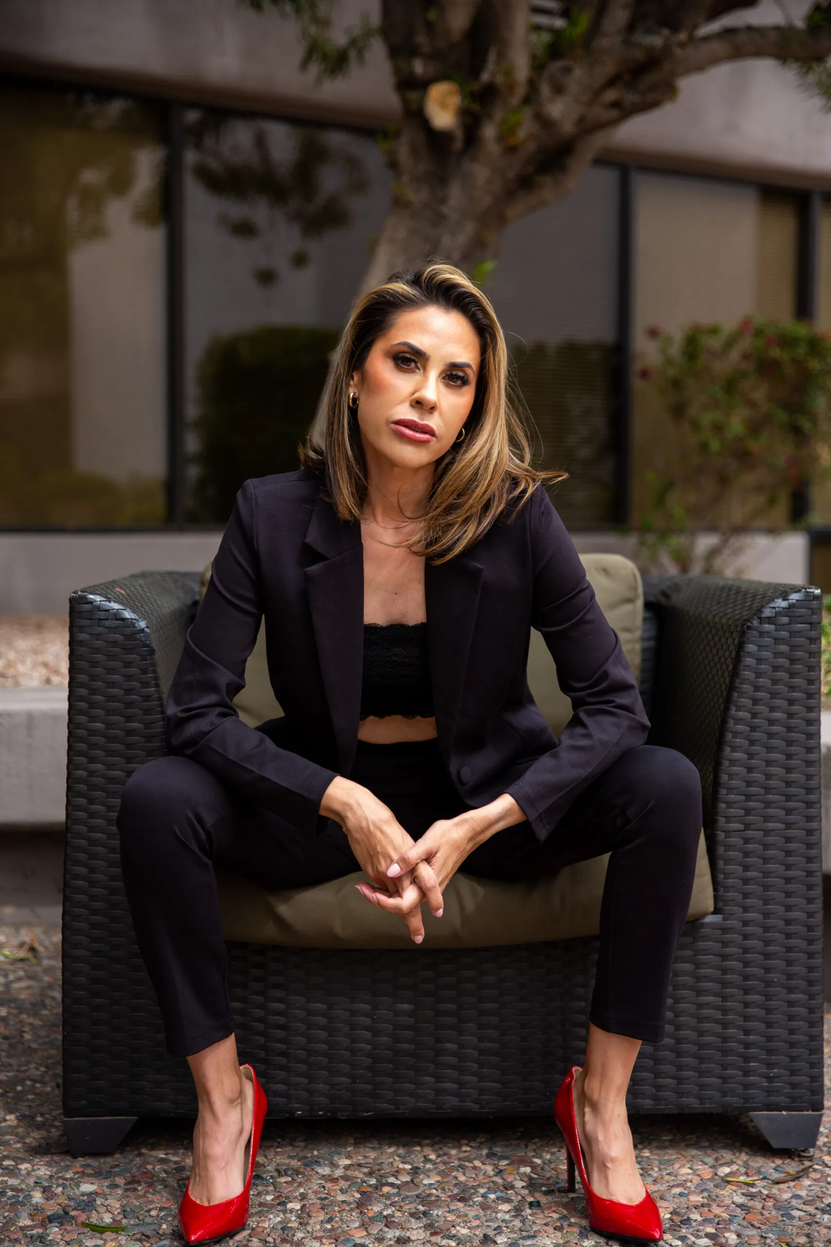 Dr. Lilia R. Feria seated in a chair